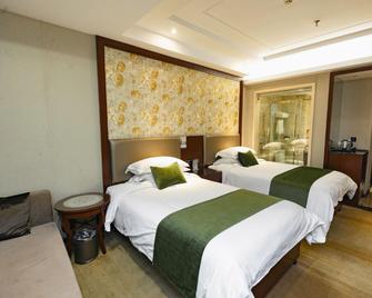 Ganzhou Pearl Hotel - Ganzhou - Slaapkamer