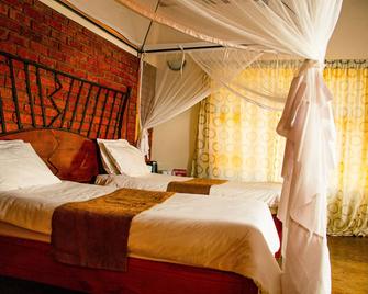 Irock Lodge - Victoria Falls - Bedroom