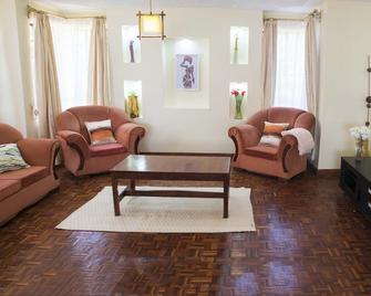 Seven's gem- 4br hse - Athi River - Living room
