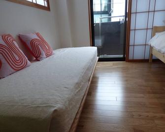 Guesthouse Hyakumanben Cross - Kyoto - Bedroom
