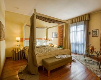 Romantic Hotel Furno - Сан-Франческо-аль-Кампо - Спальня
