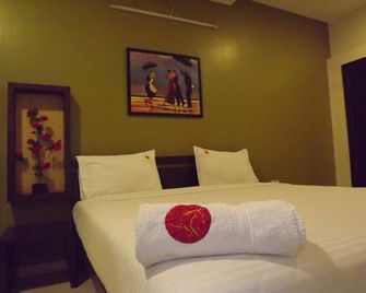 The Richman Hotel - Tiruppur - Schlafzimmer