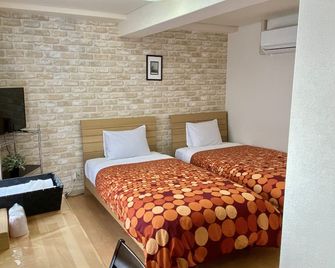 Kyoto Uraraka Guest House - קיוטו - חדר שינה