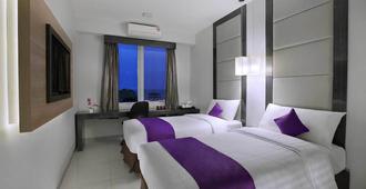 Quest Hotel Balikpapan By Aston - Balikpapan - Bedroom