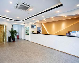 Homeinn Pebble Hotel (Rugao Haiyang North Road Shuihui Garden) - Rugao - Front desk