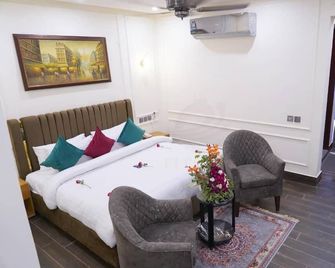 Hotel Elegant Executive Suites - Multān - Bedroom