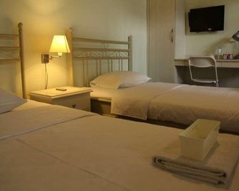 Bed And Breakfast Tomang - ג'קרטה - חדר שינה