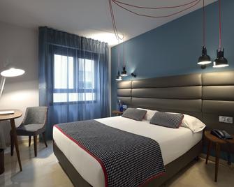 Hotel Pamplona Plaza - Pamplona - Schlafzimmer