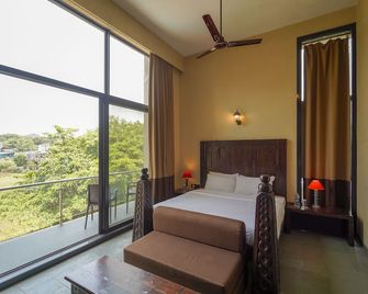 Triose Boutique Hotel Lonavala - Lonavala - Camera da letto
