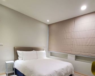 Stopover Inn - Jiaoxi - Schlafzimmer