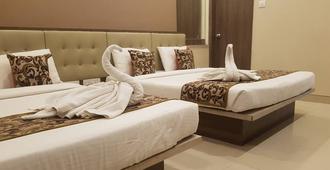 Hotel Sai Chhatra - Shirdi - Schlafzimmer