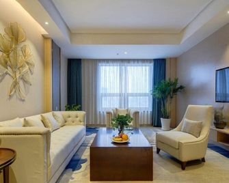 Hongteng International Hotel - Jinan - Living room