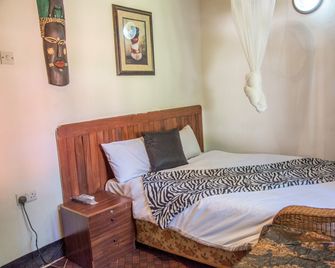 Okavango Lodge - Livingstone - Bedroom
