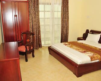 Biraj International Hotel - Kampala - Bedroom