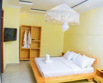 Rond Point Gorilla Boutique - Kinigi - Kinigi - Bedroom