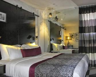 מלון סינמה - מלונות בוטיק אטלס - תל אביב - חדר שינה