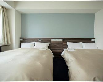 Hiroshima Pacific Hotel - Hiroshima - Bedroom