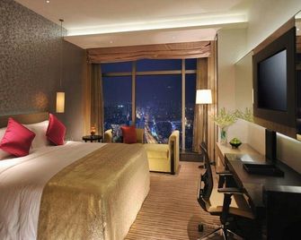 V Hotel - שנג'ן - חדר שינה