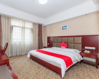 Wuhan Kanghao Hotel - E’zhou - Habitación