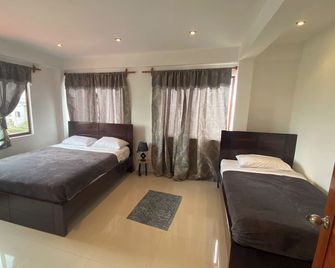 Black Pearl - Puerto Villamil - Habitación