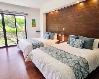 Burbi Lake Lodge Monteverde - Monteverde - Ložnice