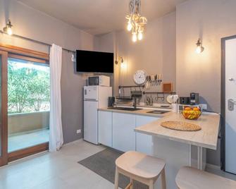 White Sand House - Happy Rentals - Marina di portisco - Cocina