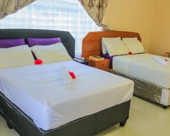 Km Executive Lodge - Livingstone - Schlafzimmer