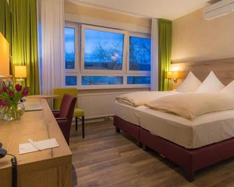 Economy single room - Hotel Central - Frankenthal - Ložnice
