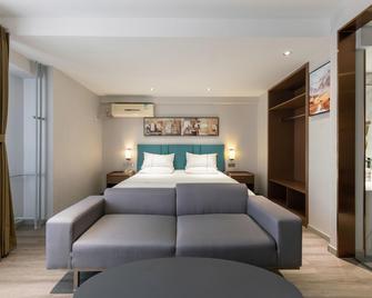 Jinjiang Inn Tianjin Konggang Branch - تيانجين - غرفة نوم