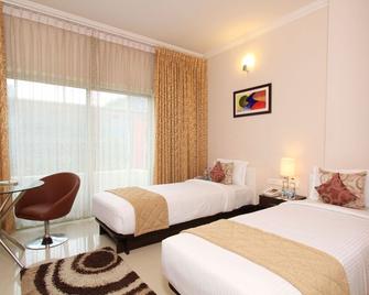 Chris Hotel Whitefield - Bangalore - Habitación