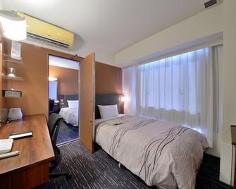 Tsuruga Manten Hotel Ekimae - Tsuruga - Спальня