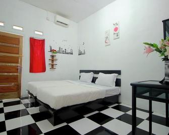 OYO 2362 Wisma Ria - Lubuklinggau - Habitación