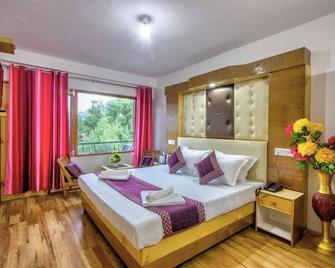 Hotel Solitaire Manali - Manali - Schlafzimmer