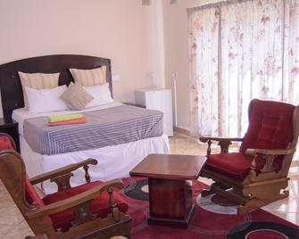 The Palace Guest House - הררה - חדר שינה