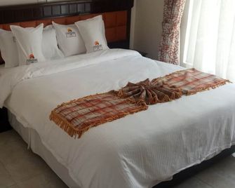 Countryhouse Inn Hotel - Naivasha - Camera da letto