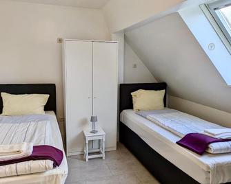 City Apartments in Neumünster - Ruhige Lage mit bester Anbindung - Neumünster - Bedroom