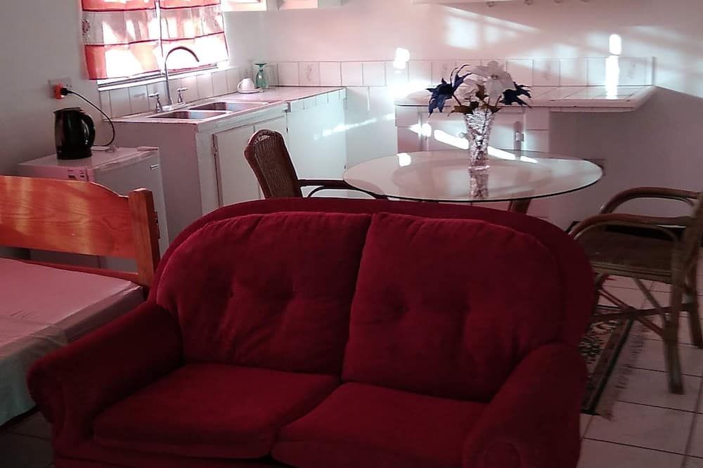 Honiiwell rooms and suites - St. George's - Salle à manger