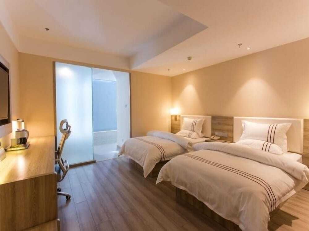 Metropolo Taiyuan World Trade Center - טיוואן - חדר שינה