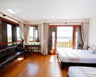 B'lan Riverside Villa - Hoi An - Soveværelse
