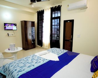 G Square Rooms - Rūpnagar - Bedroom