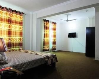 Stargaze Hotel & Apartment - Abbottabad - Bedroom
