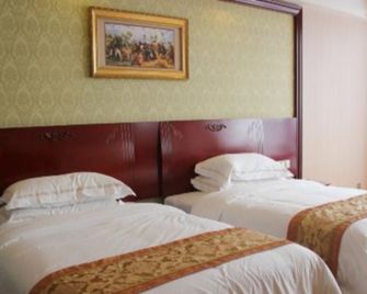 Vienna Hotel Xiangtan East Station Branch - Xiangtan - Bedroom