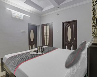 Hotel O Sv Rest Inn - Madanapalle - Bedroom