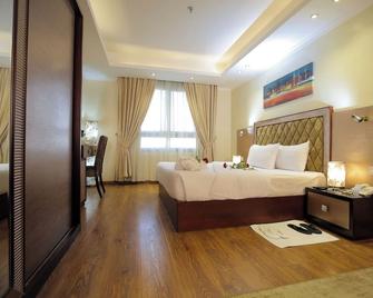 Cairo Taj Hotels & Suites - Dokki - קהיר - חדר שינה