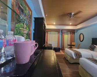 لي بوتيك هوتل تاجايتاي - تاجايتاى - غرفة نوم