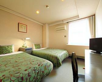 Business Hotel Park Inn Sato - Hita - Спальня