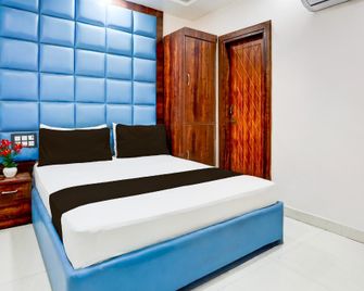 Hotel O Apple Grand - Харідвар - Спальня