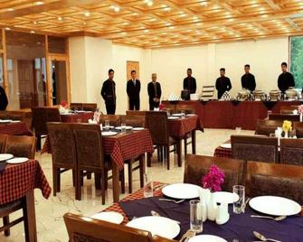 Gezellig Inn - Vardhan Hills - Manali - Restaurant