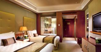 哈爾濱新加坡大酒店 - 哈爾濱 - 臥室