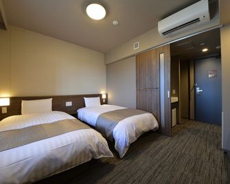 Dormy Inn Takamatsu Chuo Koenmae Natural Hot Spring - Такамацу - Спальня